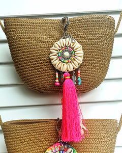 Straw bag with charm
